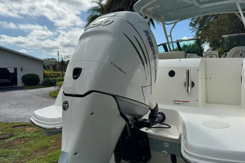  Yacht Photos Pics 2019 Boston Whaler 230 Vantage with Mercury Verado 350 engine, parked outdoors.