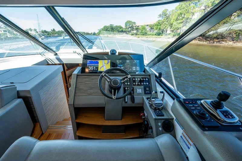  Yacht Photos Pics 2020 Tiara Yachts C53 Coupe helm with modern navigation and control systems.