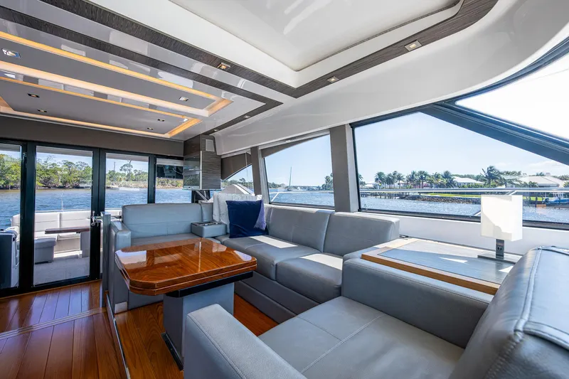  Yacht Photos Pics Luxurious interior of 2020 Tiara Yachts C53 Coupe with elegant seating and scenic views.