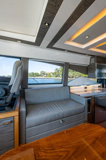  Yacht Photos Pics Interior of 2020 Tiara Yachts C53 Coupe, featuring modern seating and sleek design elements.