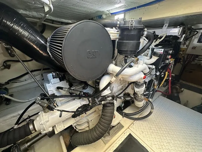  Yacht Photos Pics Engine room of 2020 Tiara Yachts C53 Coupe, showcasing detailed mechanical components.