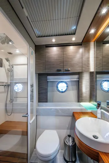  Yacht Photos Pics Luxurious bathroom in 2020 Tiara Yachts C53 Coupe with modern fixtures and elegant design.