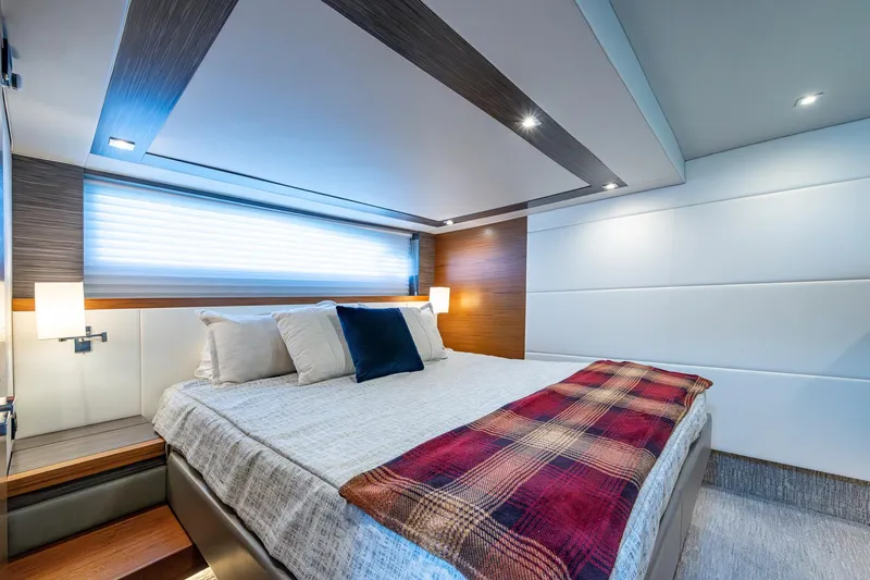  Yacht Photos Pics Luxurious bedroom interior of 2020 Tiara Yachts C53 Coupe with modern design.