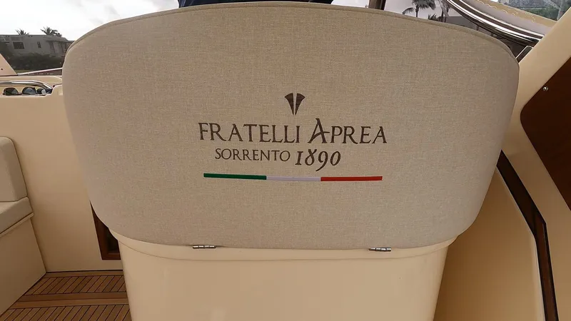 Fratelli Aprea Sorrento 32 Yacht Photos Pics Fratelli Aprea Sorrento Cabinatto 32 boat seat with logo and Italian flag, 2023 model.