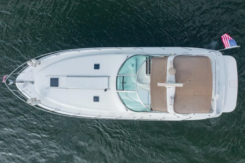 Just The Two Of Us Yacht Photos Pics Overhead view of 1997 Sea Ray 400 Sundancer yacht on water.