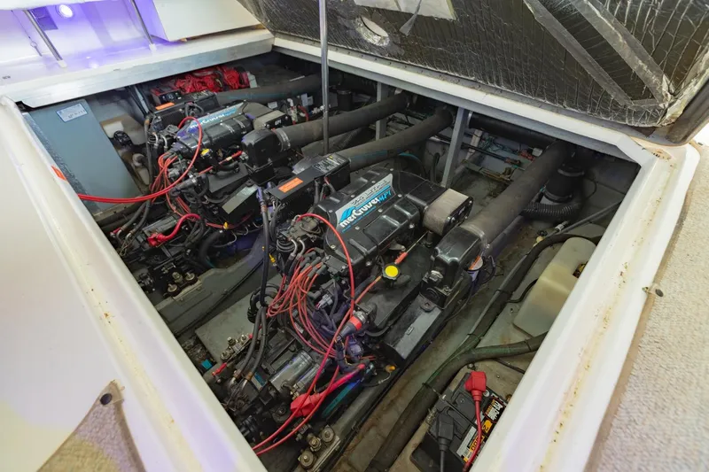 Just The Two Of Us Yacht Photos Pics Engine compartment of a 1997 Sea Ray 400 Sundancer boat, showcasing dual engines.