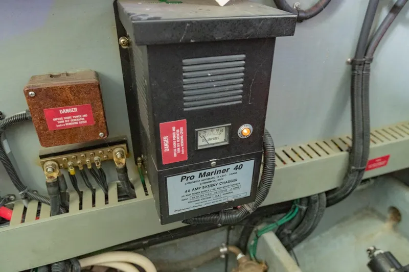 Just The Two Of Us Yacht Photos Pics Battery charger and electrical components in a 1997 Sea Ray 400 Sundancer boat.