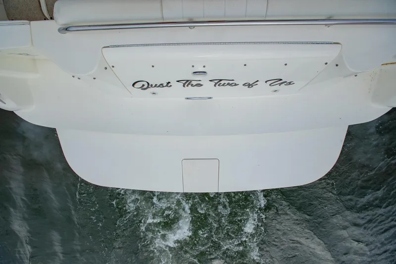 Just The Two Of Us Yacht Photos Pics 1997 Sea Ray 400 Sundancer boat stern with "Just The Two of Us" text.