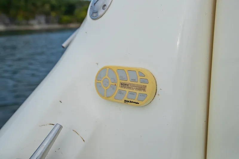 Just The Two Of Us Yacht Photos Pics Close-up of Sony control panel on 1997 Sea Ray 400 Sundancer boat.