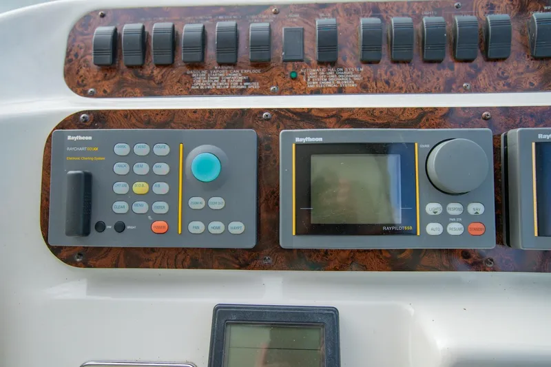 Just The Two Of Us Yacht Photos Pics Control panel of a 1997 Sea Ray 400 Sundancer with Raytheon navigation systems.