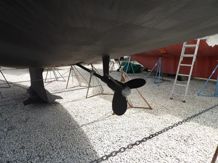 Summer Breeze Yacht Photos Pics Hunter 460 sailboat (2000) on dry dock, showing propeller and rudder.