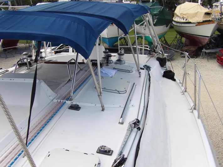 Summer Breeze Yacht Photos Pics Hunter 460 sailboat, 2000 model, with blue canopy and deck equipment.
