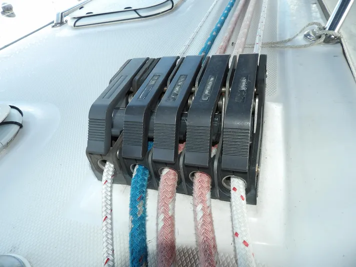 Summer Breeze Yacht Photos Pics Close-up of rope clutches on a 2000 Hunter 460 sailboat deck.