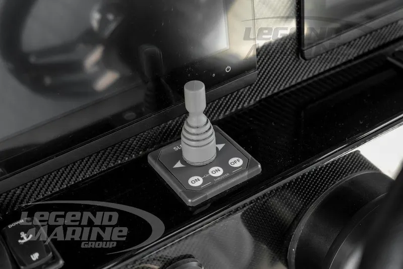  Yacht Photos Pics Control panel of 2023 Nor-Tech 390 Sport Center Console boat with joystick and buttons.