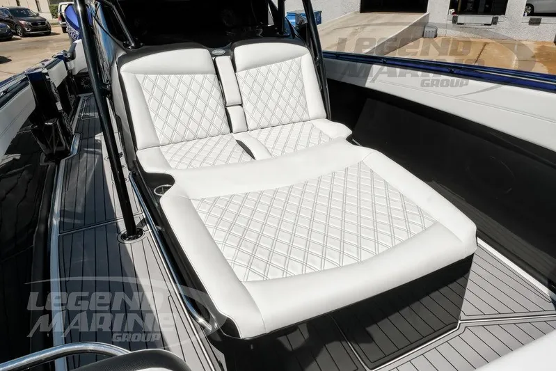  Yacht Photos Pics 2023 Nor-Tech 390 Sport Center Console with luxurious white quilted seating.
