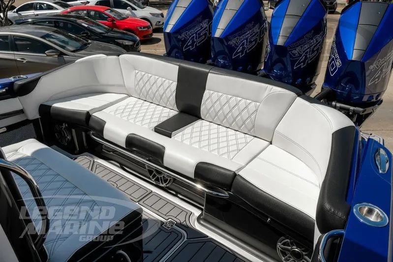  Yacht Photos Pics 2023 Nor-Tech 390 Sport Center Console with luxurious seating and powerful outboard engines.