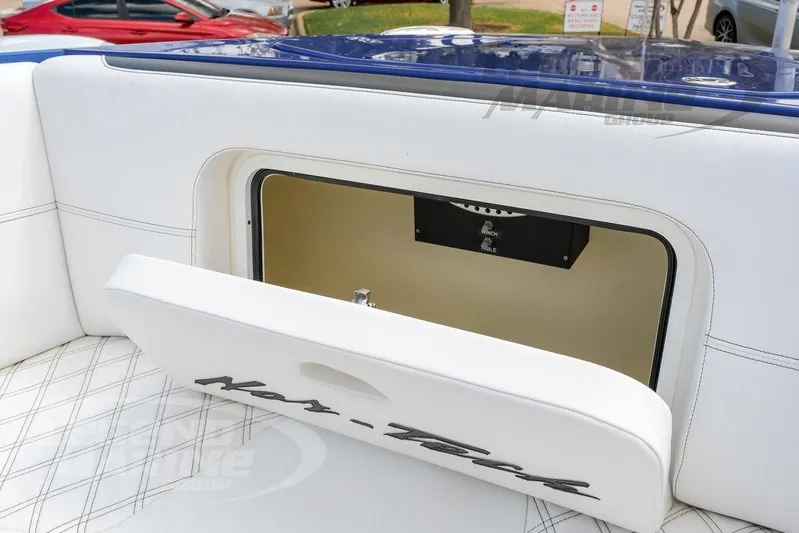  Yacht Photos Pics 2023 Nor-Tech 390 Sport Center Console storage compartment with white cushioned seating.