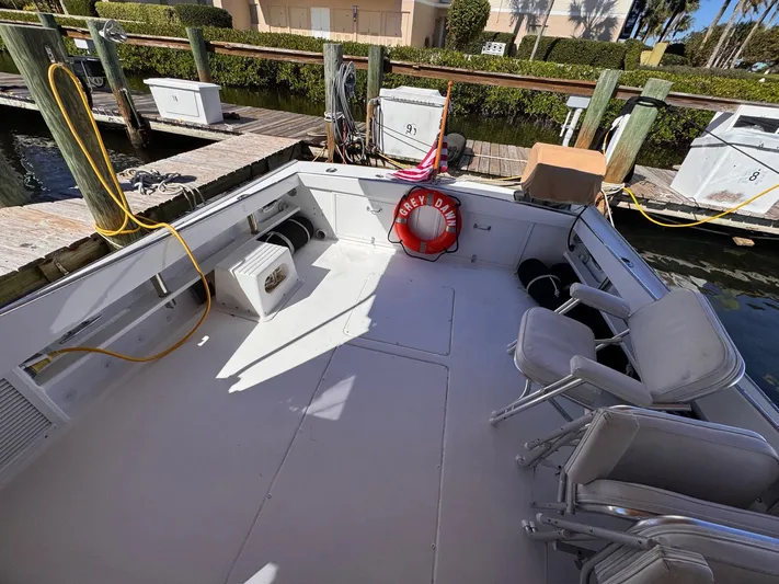 Grey Dawn Yacht Photos Pics 1987 West Bay James Beal 31 Hardtop Lobster Boat docked, featuring spacious deck and seating.