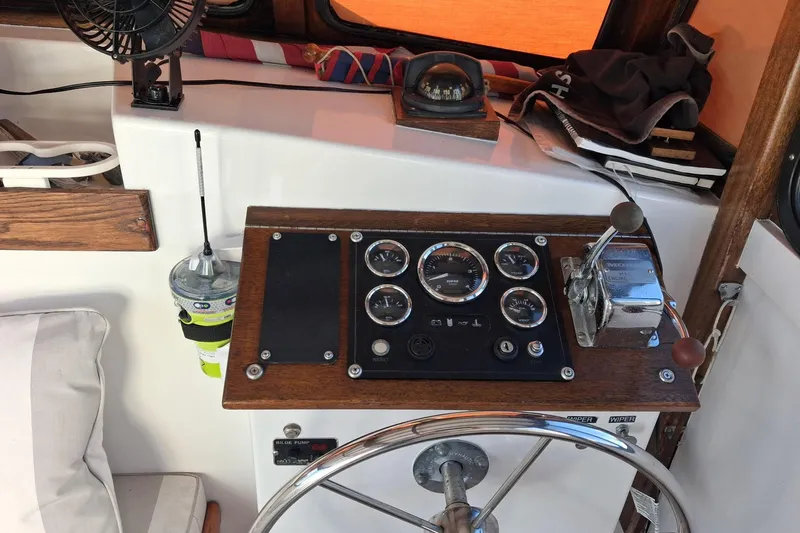Grey Dawn Yacht Photos Pics 1987 West Bay James Beal 31 Hardtop Lobster Boat dashboard with gauges and controls.