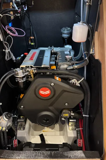  Yacht Photos Pics Engine compartment of 2023 Beneteau First 53 sailboat, showcasing modern mechanical components.