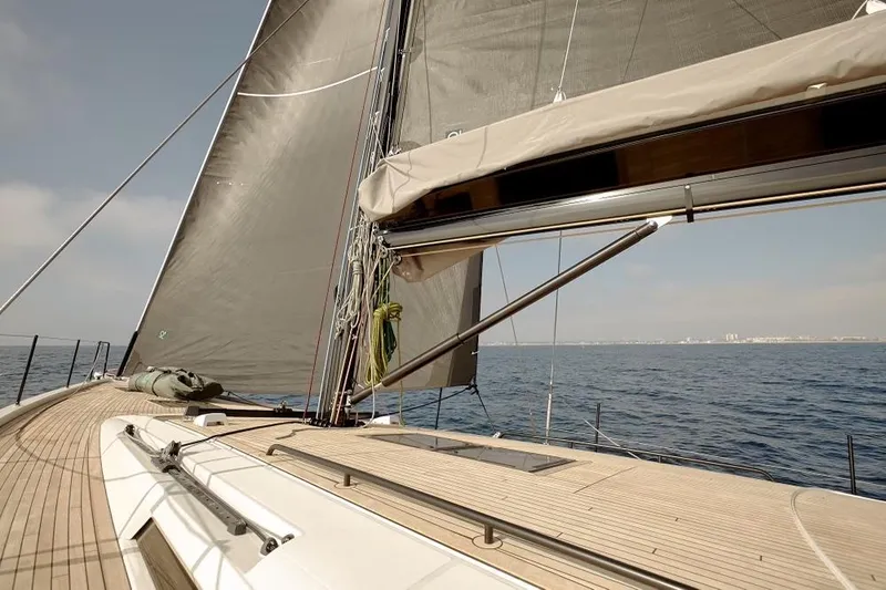  Yacht Photos Pics Beneteau First 53 sailboat, 2023 model, sailing on open water with clear skies.