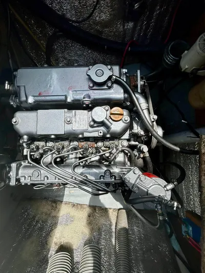  Yacht Photos Pics Engine of a 2010 Lagoon 400 catamaran, showcasing intricate mechanical components.