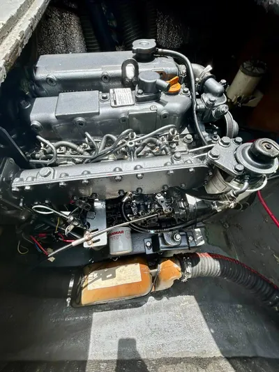  Yacht Photos Pics Engine compartment of a 2010 Lagoon 400 catamaran, featuring a Yanmar marine engine.