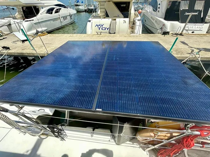  Yacht Photos Pics Solar panels on a 2010 Lagoon 400 catamaran docked at a marina.