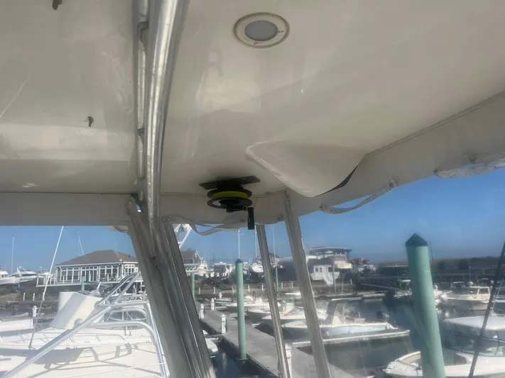  Yacht Photos Pics 2002 Cabo 35 Flybridge boat interior view at marina.