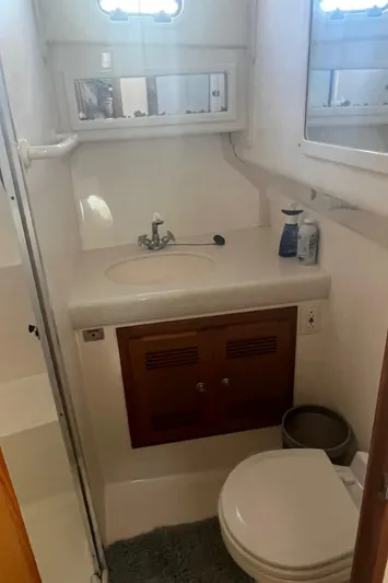  Yacht Photos Pics 2002 Cabo 35 Flybridge boat bathroom interior view.