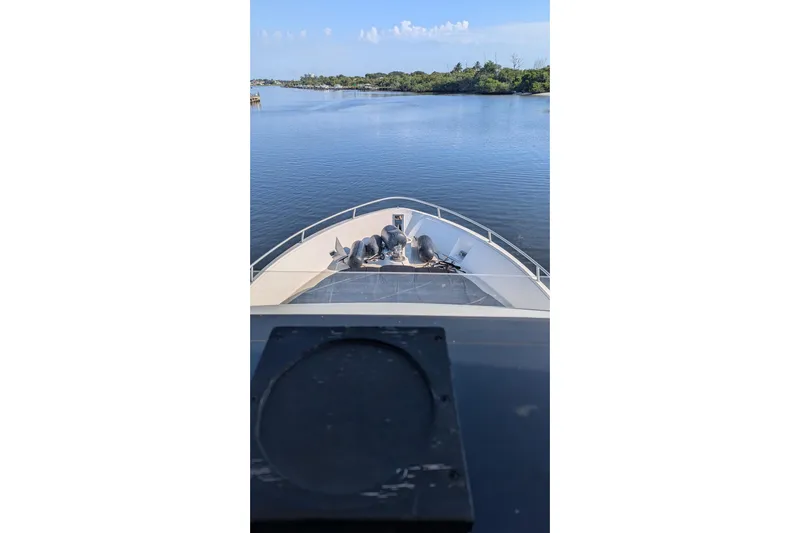  Yacht Photos Pics Bow view of 1992 Viking 65 Motor Yacht cruising on calm waters.