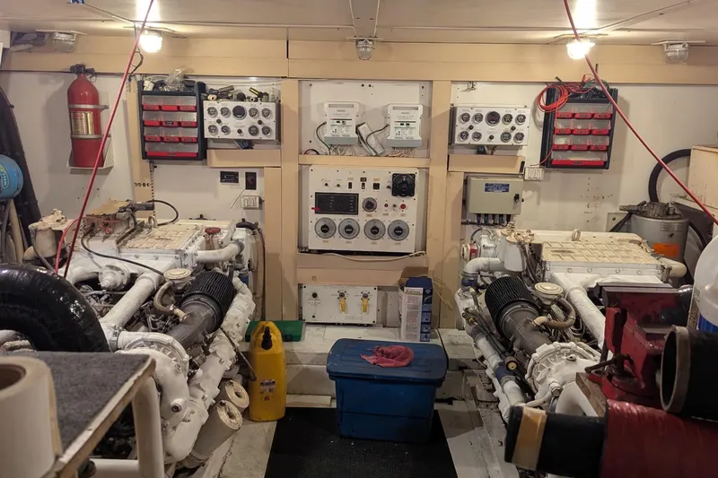  Yacht Photos Pics Engine room of a 1992 Viking 65 Motor Yacht with control panels and equipment.