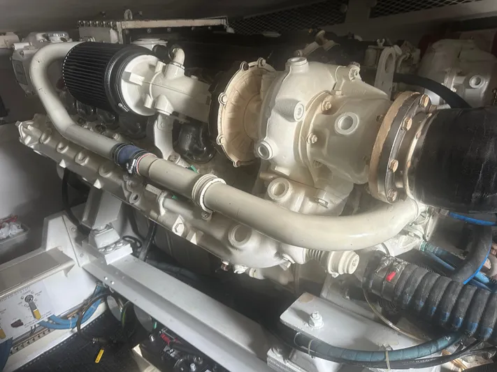  Yacht Photos Pics Engine of a 1998 Viking 53 Convertible boat, showcasing intricate mechanical components.