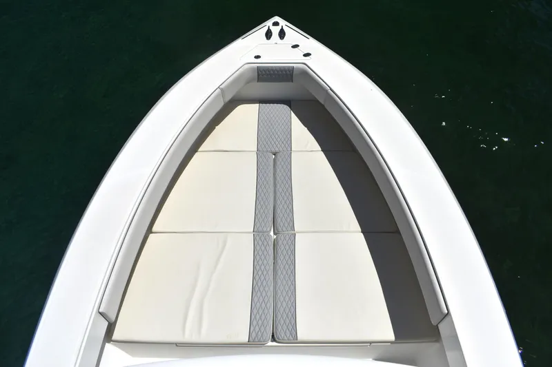  Yacht Photos Pics Bow of 2005 Venture 39 Open boat with cushioned seating.