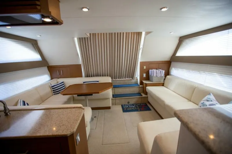 Tropical Life Yacht Photos Pics Luxurious interior of 2012 Carver Sojourn yacht with elegant seating and modern design.