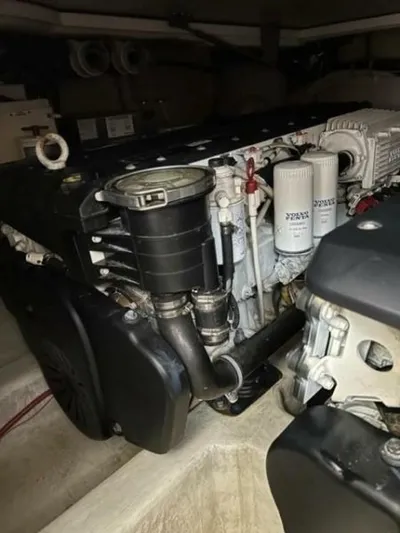 Tropical Life Yacht Photos Pics Engine of a 2012 Carver Sojourn, showcasing intricate components and filters.