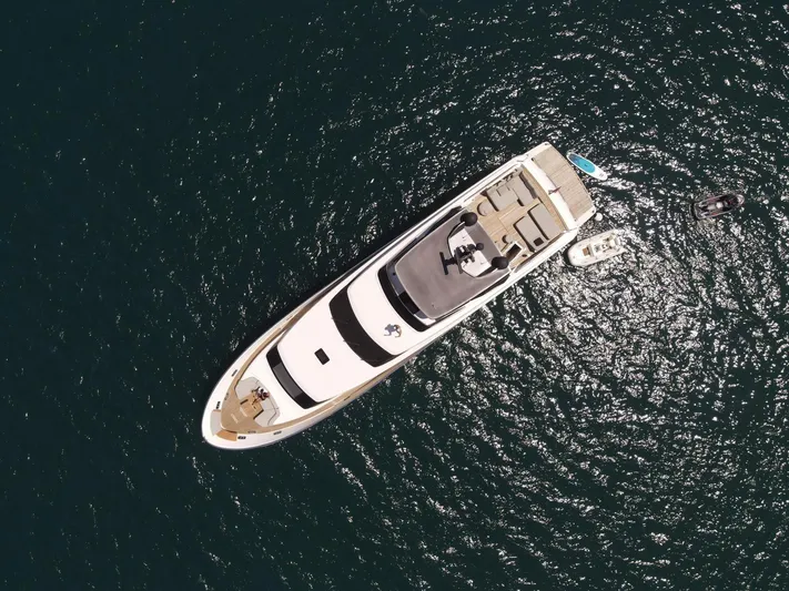 Sanlorenzo Sl96 Yacht Photos Pics Aerial view of 2016 Sanlorenzo SL96 yacht on open water with small boats nearby.