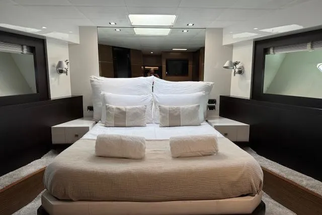  Yacht Photos Pics Luxurious bedroom interior of 2007 Astondoa A 76 GLX yacht with elegant bedding.