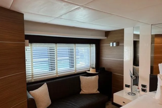  Yacht Photos Pics Luxurious interior of 2007 Astondoa A 76 GLX yacht with modern furnishings and window blinds.