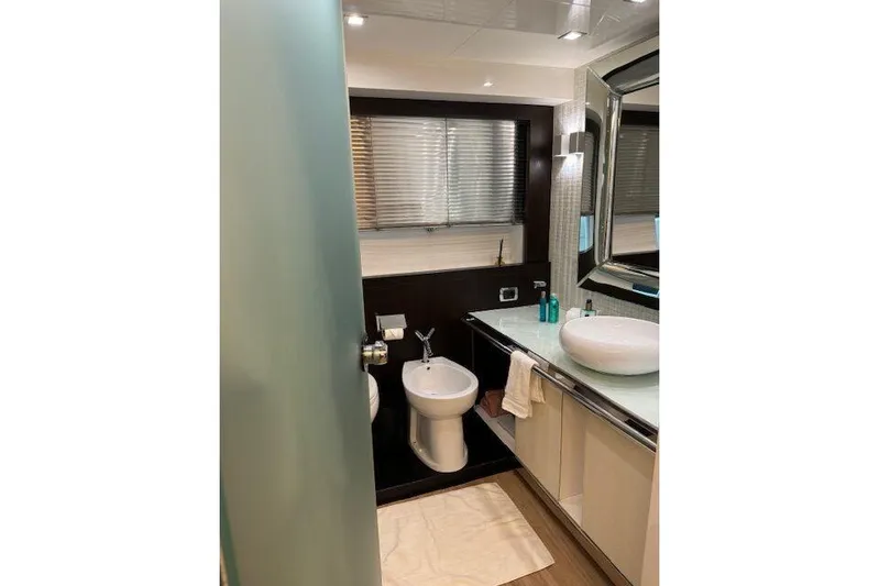  Yacht Photos Pics Luxurious bathroom on 2007 Astondoa A 76 GLX yacht with modern fixtures and elegant design.