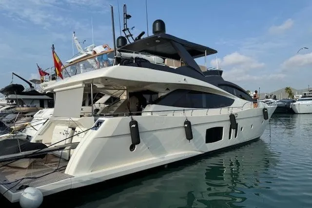  Yacht Photos Pics Luxury 2007 Astondoa A 76 GLX yacht docked in marina, side view.