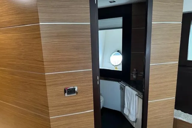  Yacht Photos Pics Luxurious bathroom interior on 2007 Astondoa A 76 GLX yacht with wood paneling.