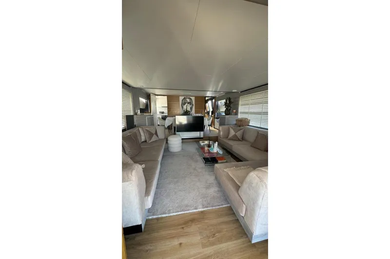  Yacht Photos Pics Luxurious interior of 2007 Astondoa A 76 GLX yacht with plush seating and modern decor.