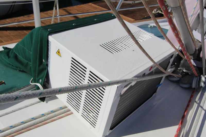 Oya Yacht Photos Pics Air conditioning unit on 2001 Beneteau Oceanis 461 sailboat deck.
