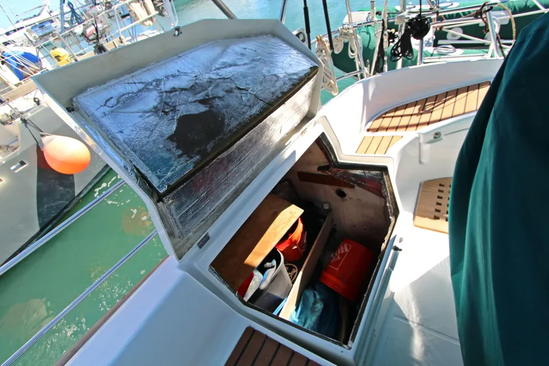 Oya Yacht Photos Pics Open storage compartment on 2001 Beneteau Oceanis 461 sailboat, docked at marina.