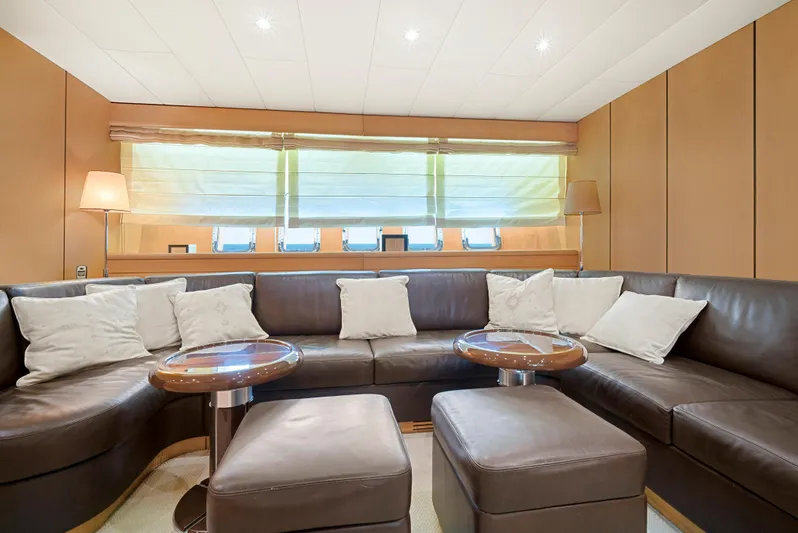 Gabriela G Yacht Photos Pics Luxurious interior of 2001 Mangusta 72 yacht with leather seating and elegant decor.