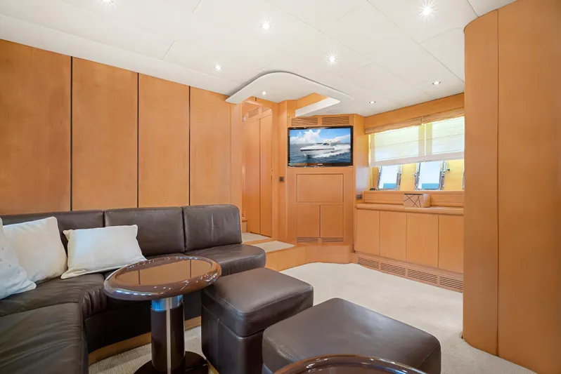 Gabriela G Yacht Photos Pics Luxurious interior of 2001 Mangusta 72 yacht with leather seating and modern decor.