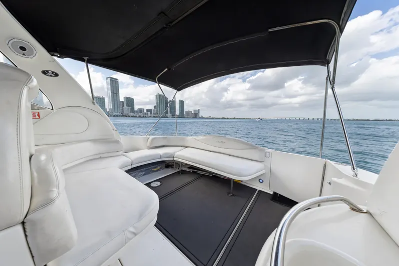 Genesis Yacht Photos Pics 2003 Sea Ray 380 Sundancer boat interior with city skyline and ocean view.