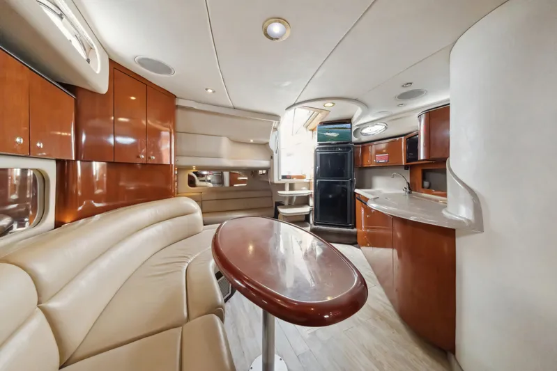 Genesis Yacht Photos Pics Interior of 2003 Sea Ray 380 Sundancer yacht with elegant wood and leather finishes.