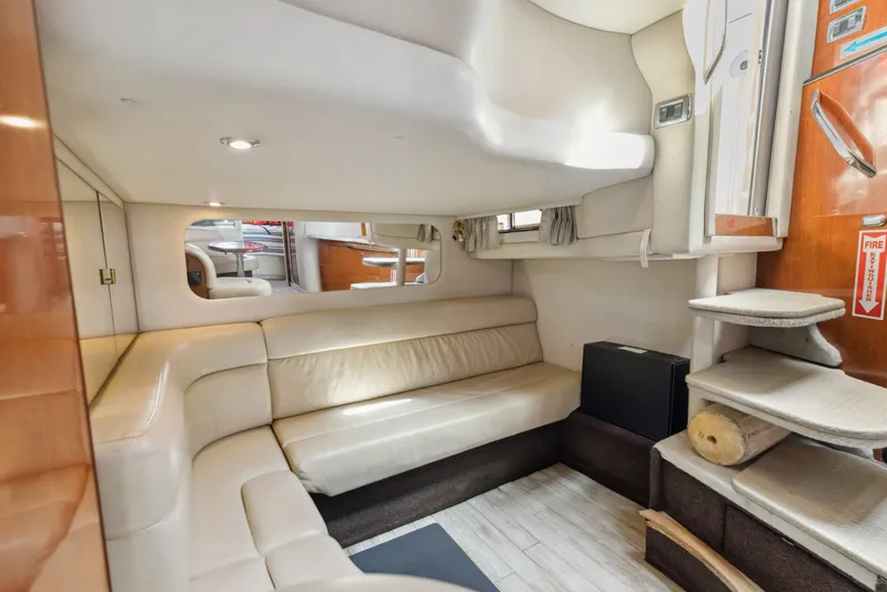 Genesis Yacht Photos Pics Interior of 2003 Sea Ray 380 Sundancer yacht with beige seating and modern design.